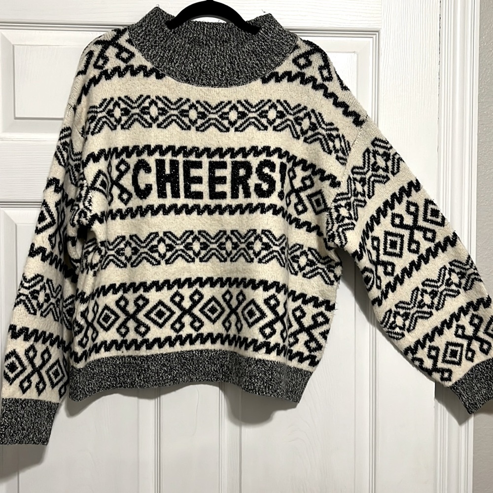Woman’s XL holiday sweater. Black and white with sparkles.